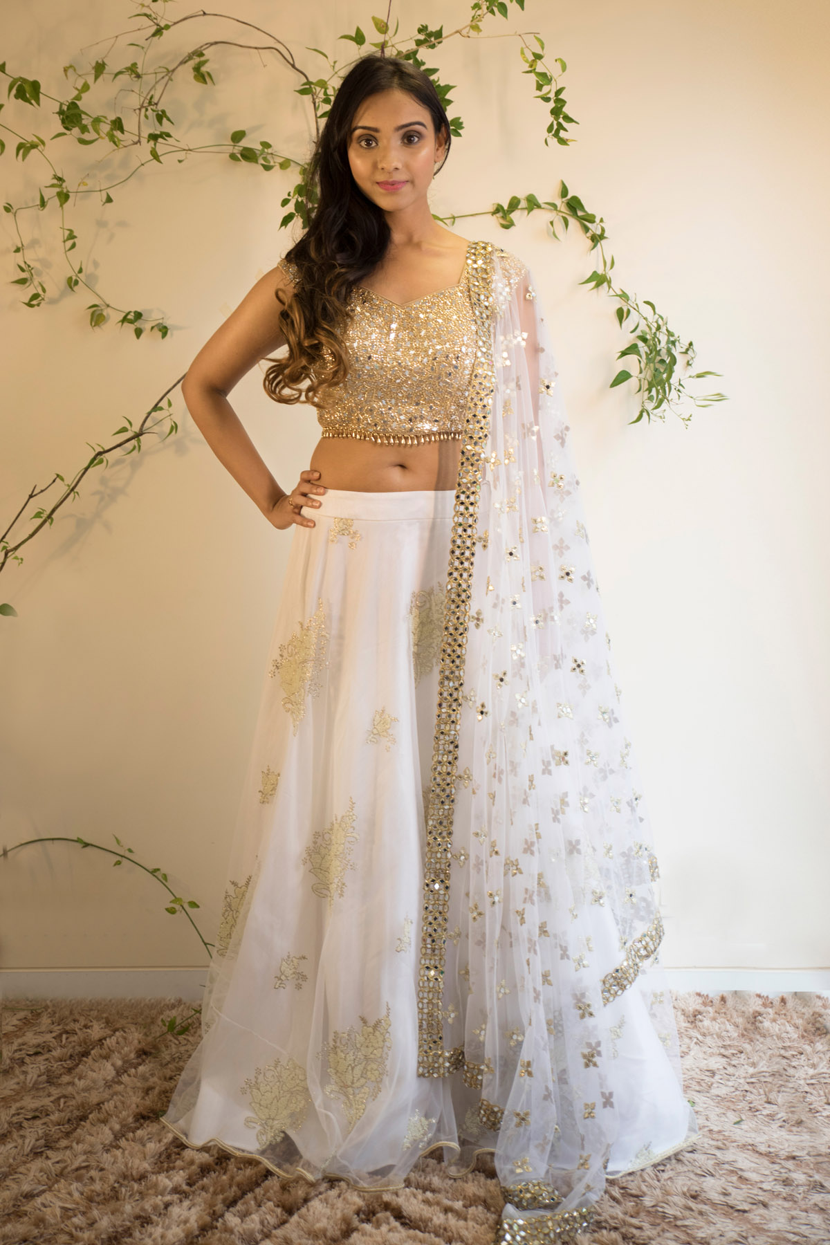 Net and Rawsilk Fabric Golden color Lehenga & Choli with Resham dori  Embroidery with stone Work and Net Dupatta with Embroidery