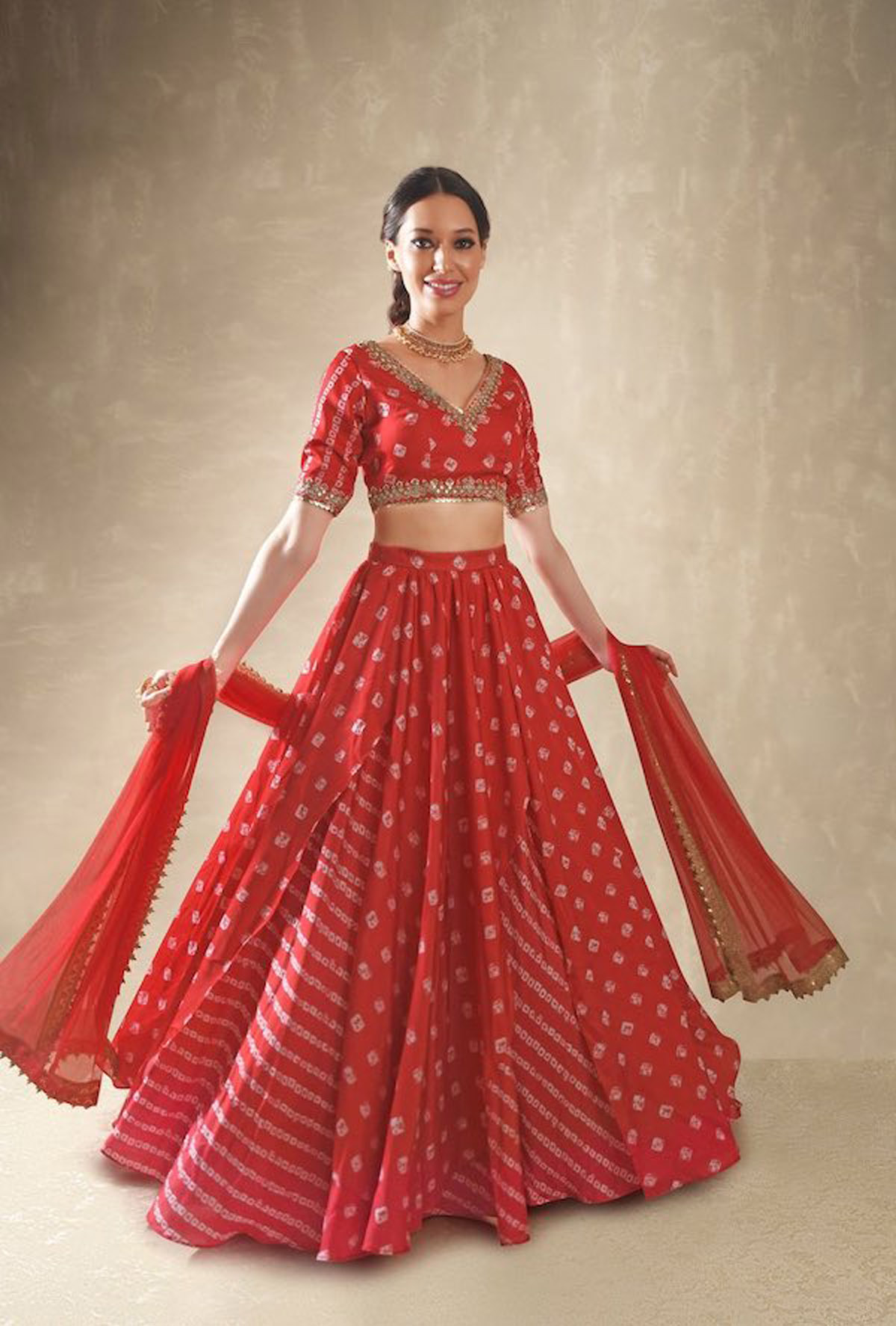 Buy Ivory Lehenga Set with a Red Blouse and a Bandhani Dupatta by Designer  NIDHI THOLIA Online at Ogaan.com