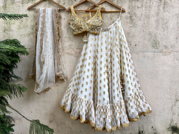 Ivory Ruffle Lehenga Set with Yellow Mirror Work Blouse Black Thread Co Ivory Ruffle Lehenga Set with Yellow Mirror Work Blouse Black Thread Co