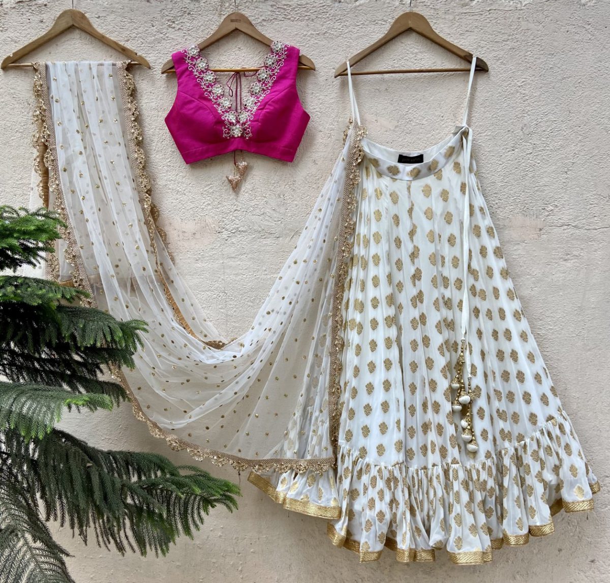 Ivory Ruffle Lehenga and Fuchsia Blouse Set Black Thread Co