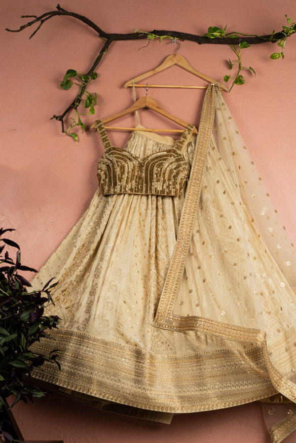Beige Multipanel Gold Lehenga Set With Gold Blouse Black Thread Co