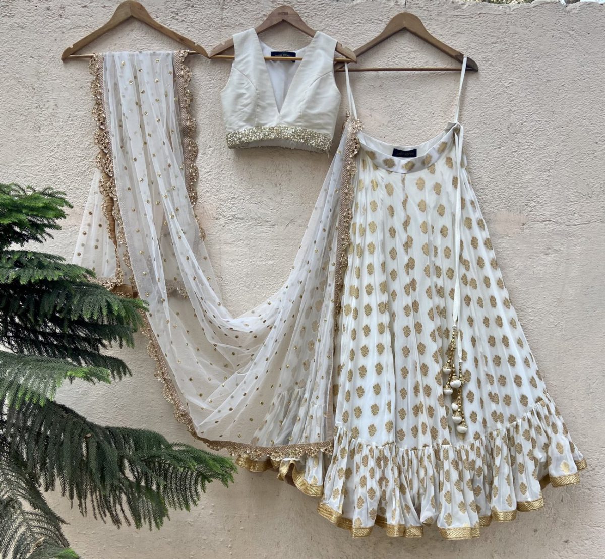 Ivory Ruffle Lehenga and Raw Silk Blouse Set Black Thread Co