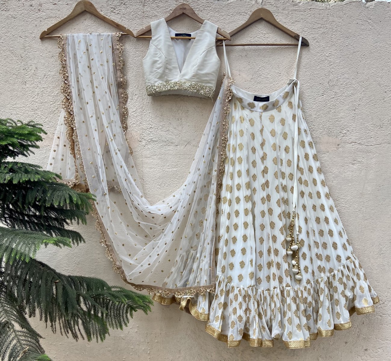 Ivory Ruffle Lehenga and Yellow Bustier Set Black Thread Co 2