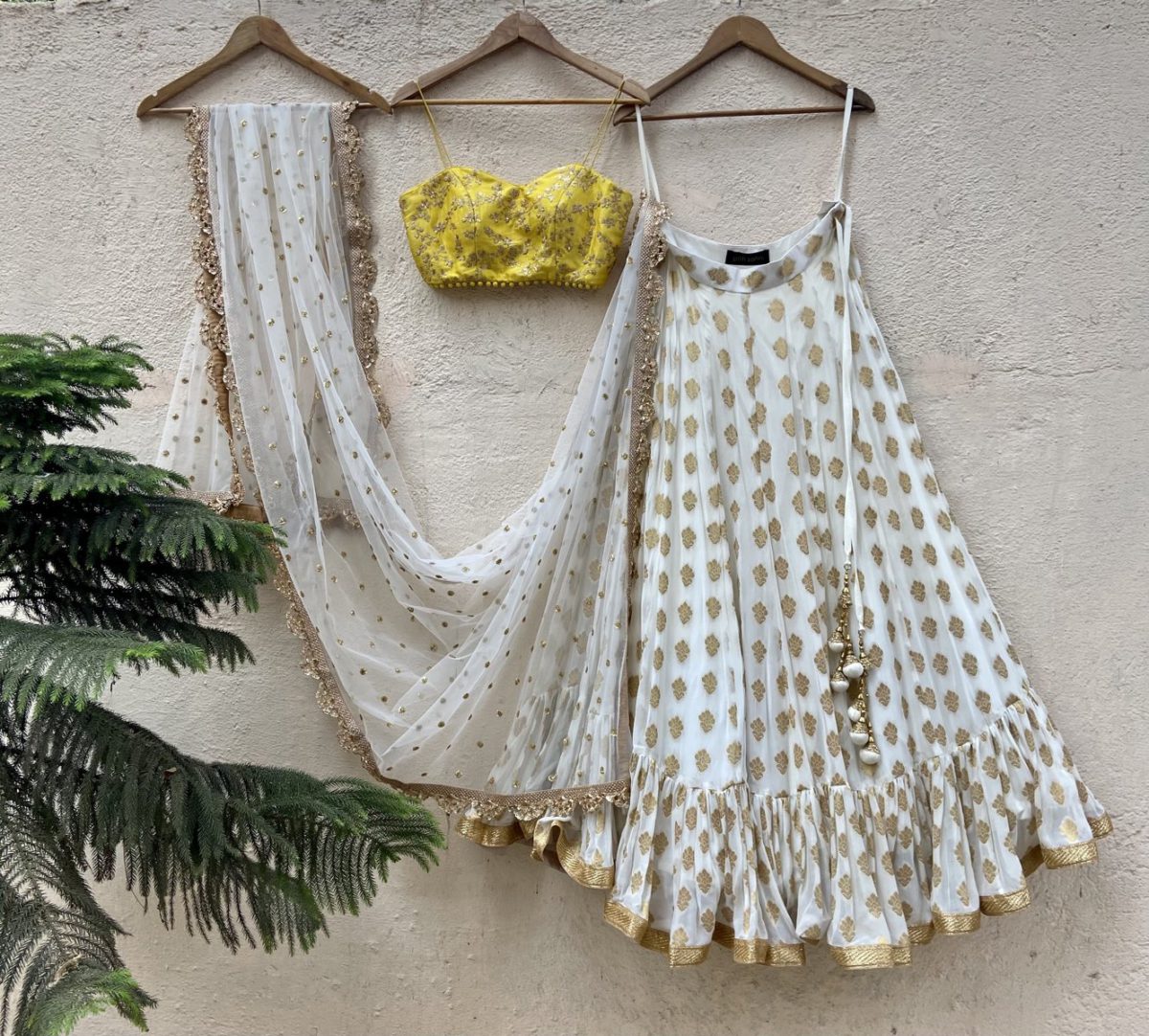 Ivory Ruffle Lehenga and Yellow Bustier Set Black Thread Co