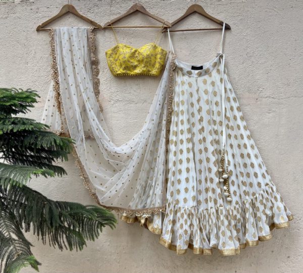 Ivory Ruffle Lehenga and Yellow Bustier Set Black Thread Co Ivory Ruffle Lehenga and Yellow Bustier Set Black Thread Co