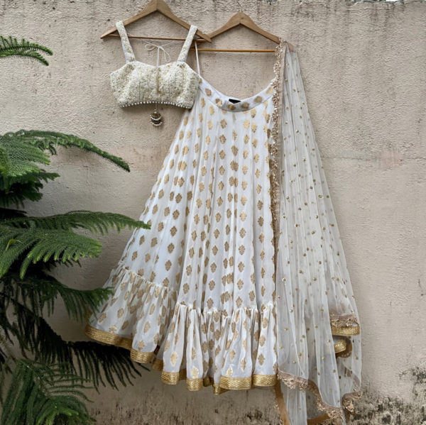 Ivory Ruffle Lehenga Set with Thread Work Bustier Black Thread Co